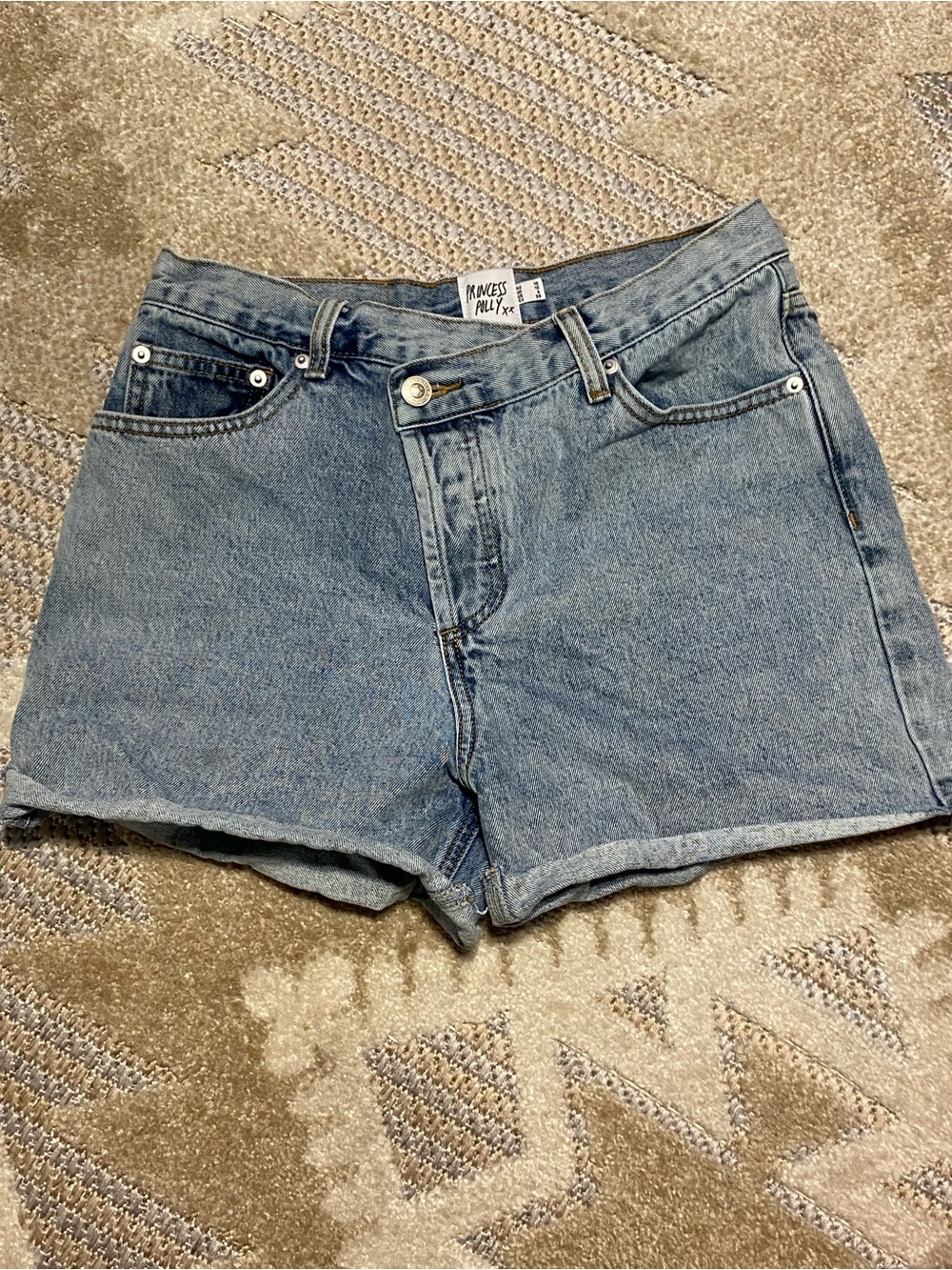 Princess Polly high waisted denim cut off shorts